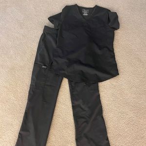 Cherokee Scrub set in steel grey. Top is XS bottoms XXS